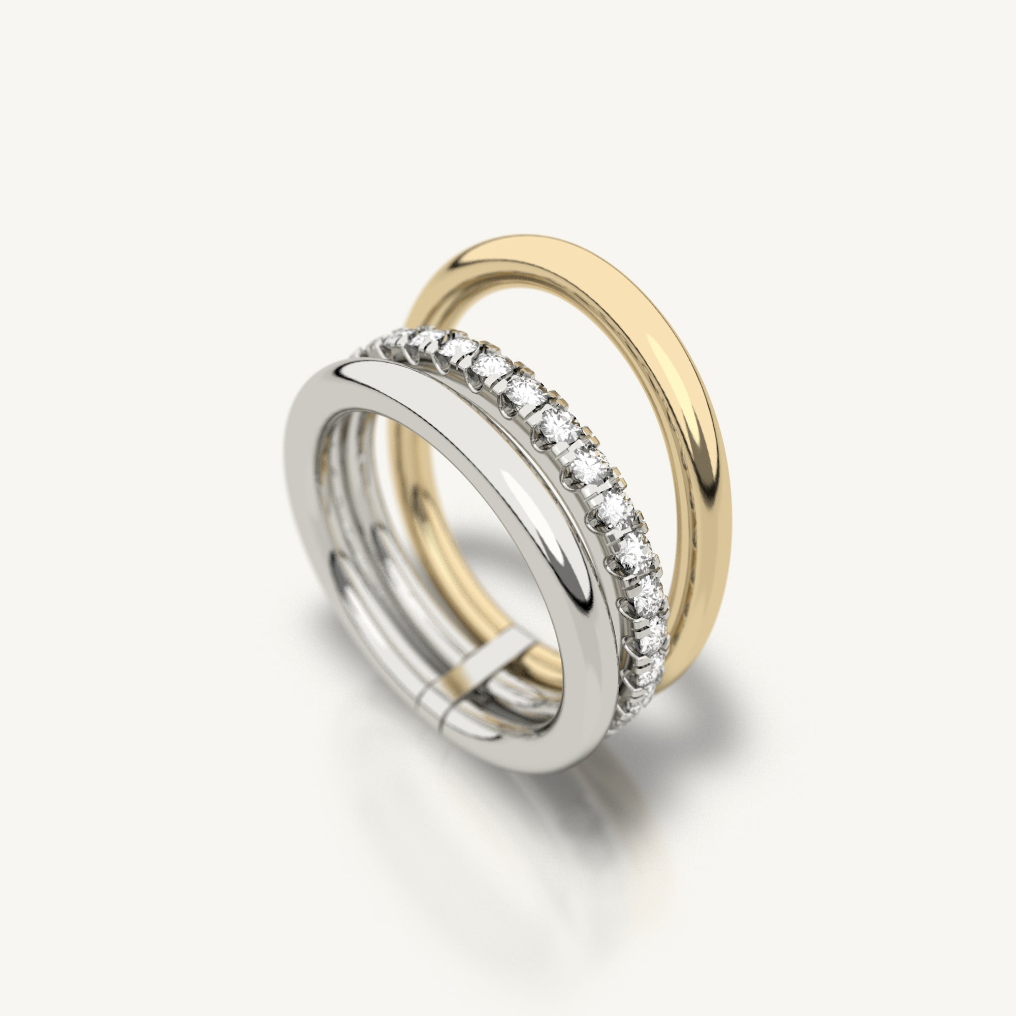 Trio ring from Inacio made from 18k recycled white gold and yellow gold with lab grown diamonds